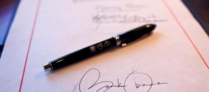 President Obama signs the Fiscal Year 2010 Consolidated Appropriations Act